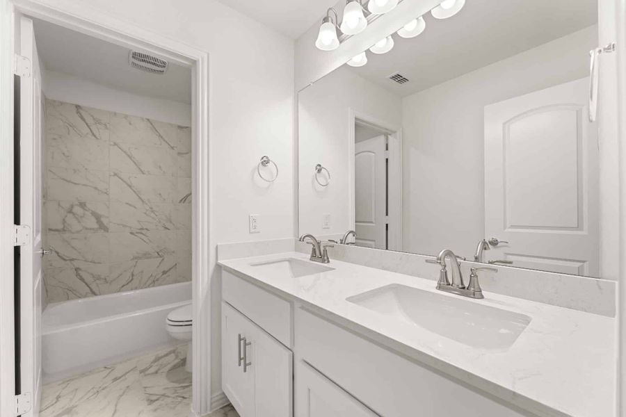 Representative furnished interior of a home built from the Walton by UnionMain Homes in Elevon, Lavon (Image 12).