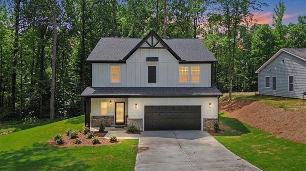 Front exterior of a new home in , Canton, GA, highlighting curb appeal (Image 26). Front exterior of a new home in , Canton, GA, highlighting curb appeal (Image 26).