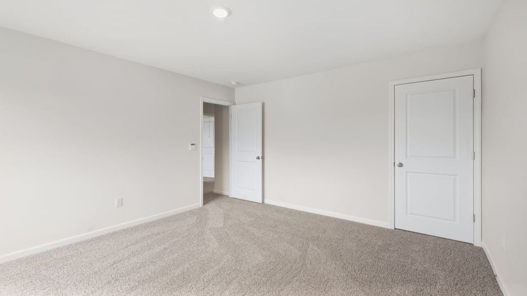 Spacious, unfurnished interior of a new home in Durbin Meadows Traditions, Fountain Inn (Image 32).