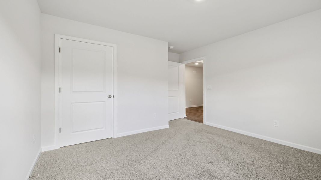 Spacious, unfurnished interior of a new home in Bentley Park, Greenwood (Image 17).