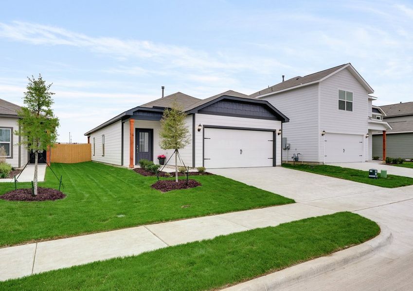 The Cedar has an attached two-car garage. The Cedar has an attached two-car garage.