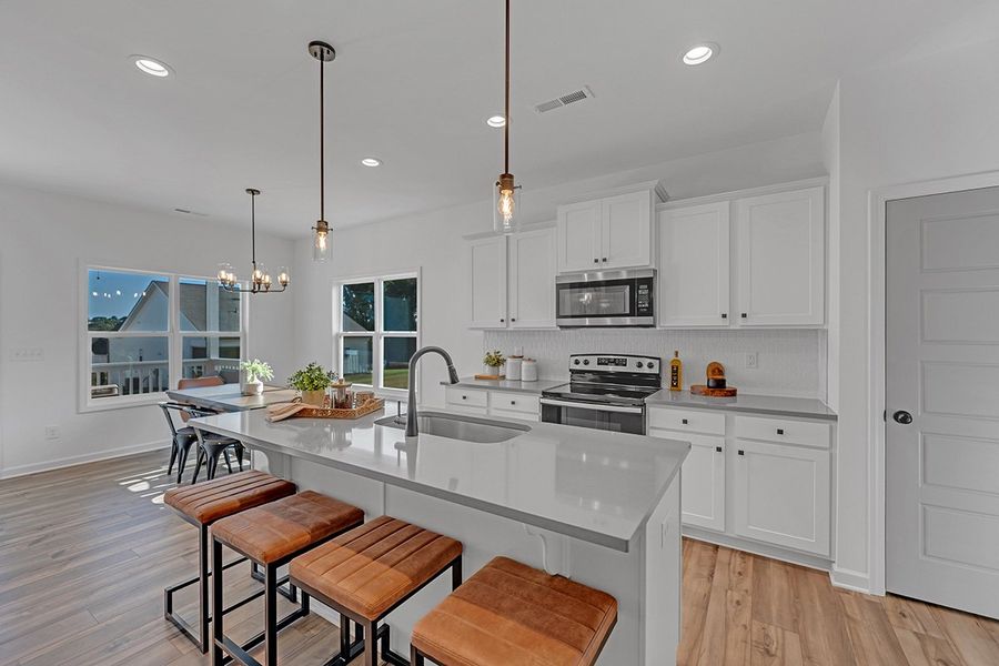 Representative furnished interior of a home built from the Blossom by Great Southern Homes in Oak Hollow, Longs (Image 14).