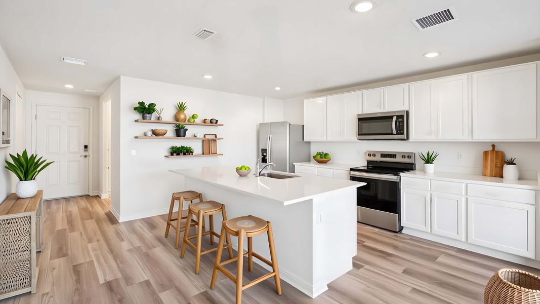 Representative furnished interior of a home built from the Ensley by D.R. Horton in Sandal Key, Weeki Wachee (Image 5).