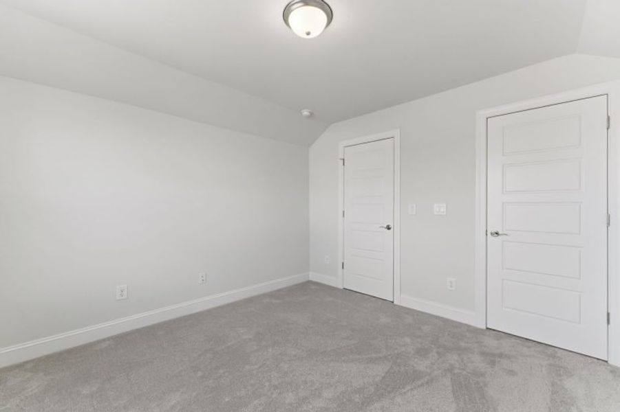 Representative unfurnished interior of a home built from the Fairfield Lux by Keystone Homes NC in Weybridge, Burlington (Image 97).