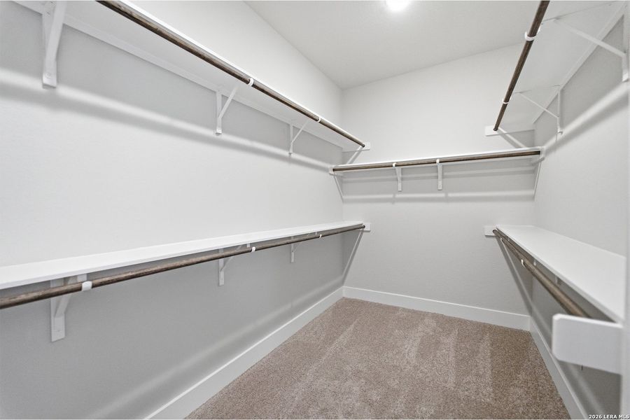 Spacious, unfurnished interior of a new home in The Woodlands at Medina Hills, Mico (Image 19).