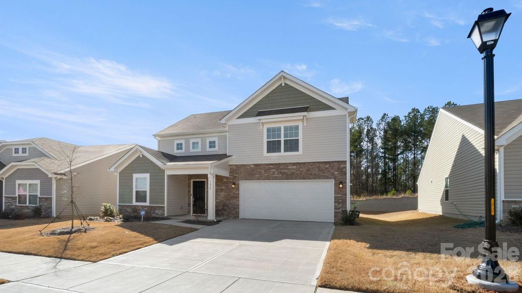 Front exterior of a new home in Walkers Mill, Edgemoor, SC, highlighting curb appeal (Image 2).