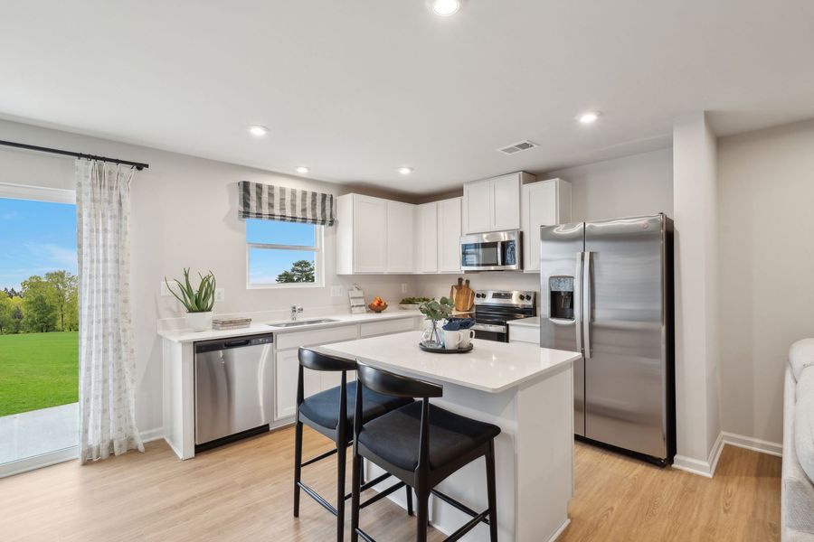 Representative furnished interior of a home built from the The Rutledge by Stanley Martin Homes in Essence at Trinity Townhomes, Columbia (Image 43).