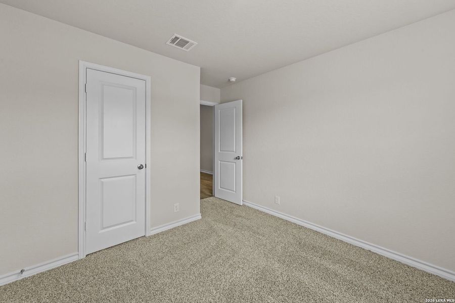 Spacious, unfurnished interior of a new home in Brookstone Creek, San Antonio (Image 29).