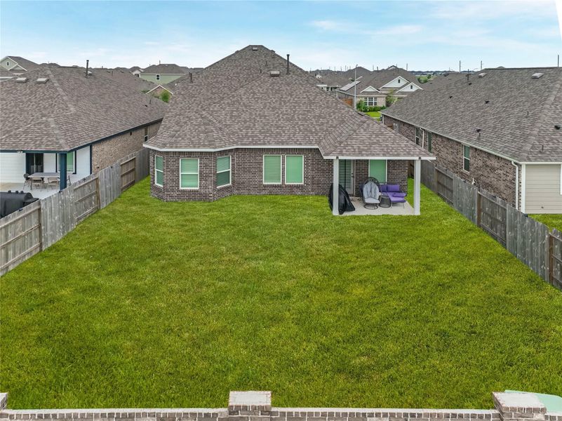 Enjoy a spacious backyard for entertainment
