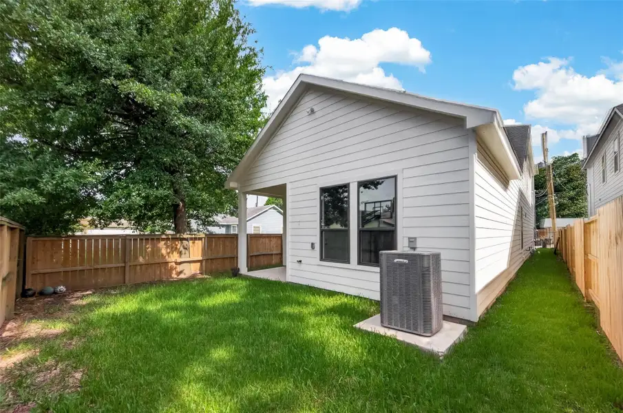 Exterior details and patio area of a home in , Houston (Image 4).