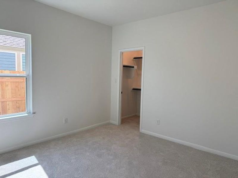 Neutral painted walls with light-colored carpeting Neutral painted walls with light-colored carpeting