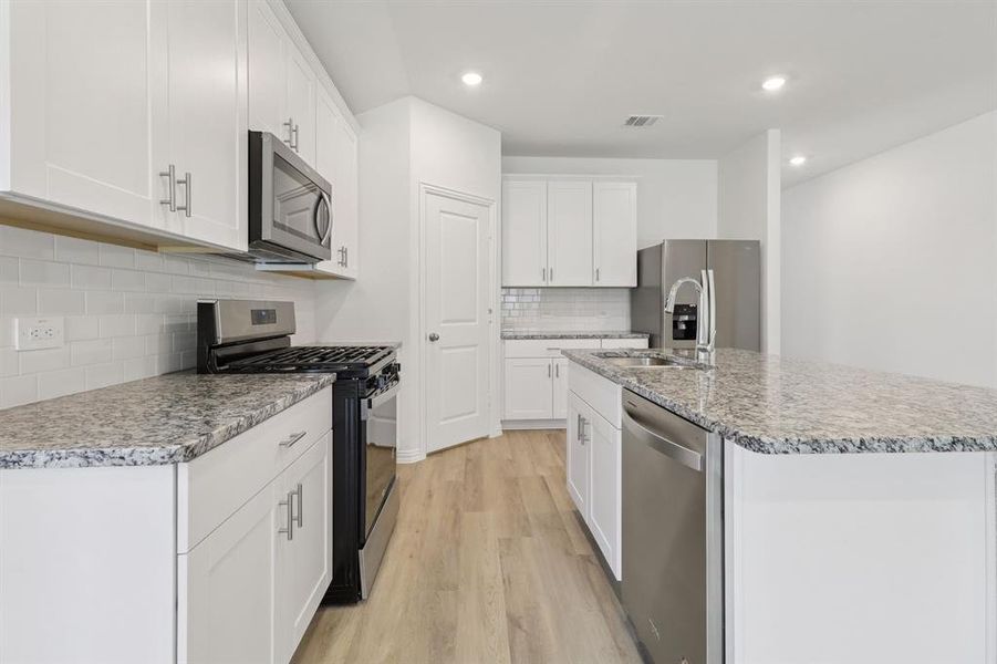 Photo is not of the actual home, but is an inspirational photo of builder’s model home and may depict options, furnishings, and/or decorator features that are not included.