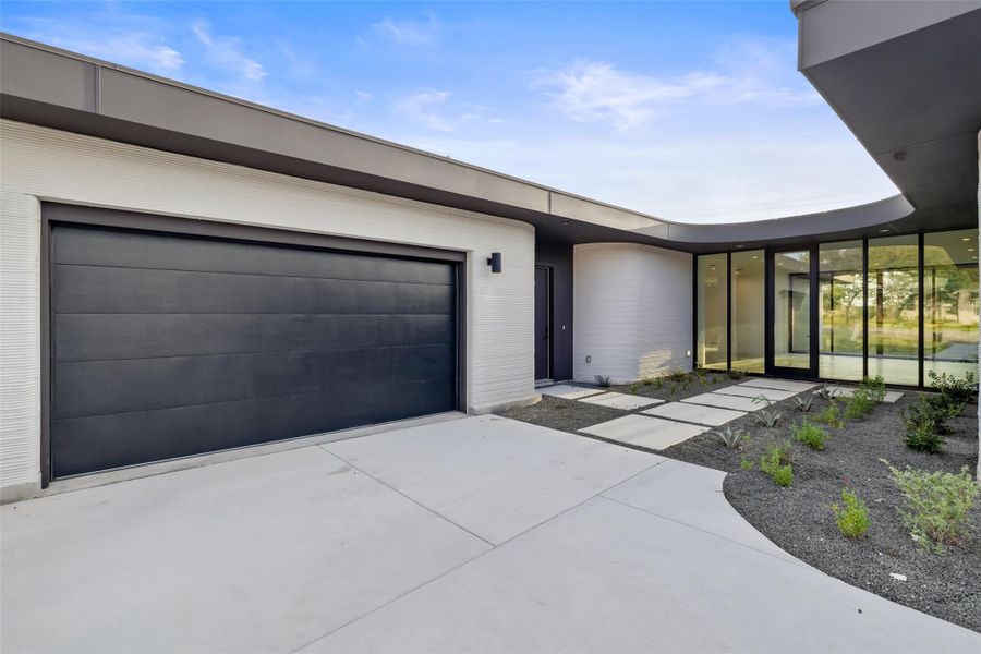 Front exterior of a new home in Wimberley Springs, Wimberley, TX, highlighting curb appeal (Image 2).