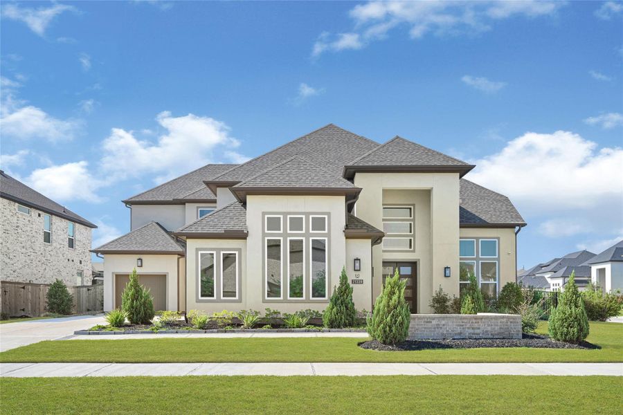 Front exterior of a new home in , Cypress, TX, highlighting curb appeal (Image 2). Front exterior of a new home in , Cypress, TX, highlighting curb appeal (Image 2).