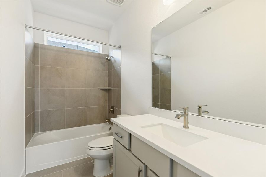 Furnished interior view inside a new home in Bridgeland Central, Cypress (Image 14).