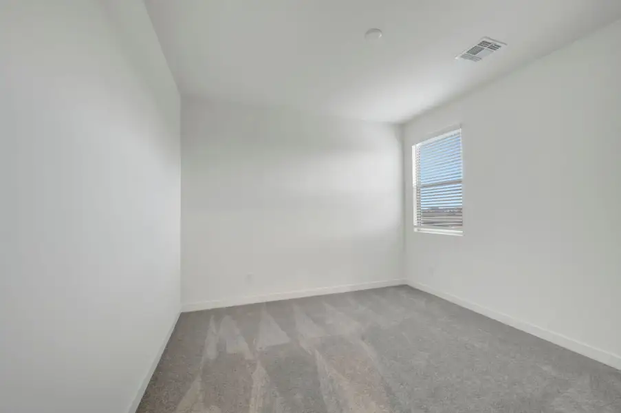 Spacious, unfurnished interior of a new home in Soleo, San Tan Valley (Image 35).