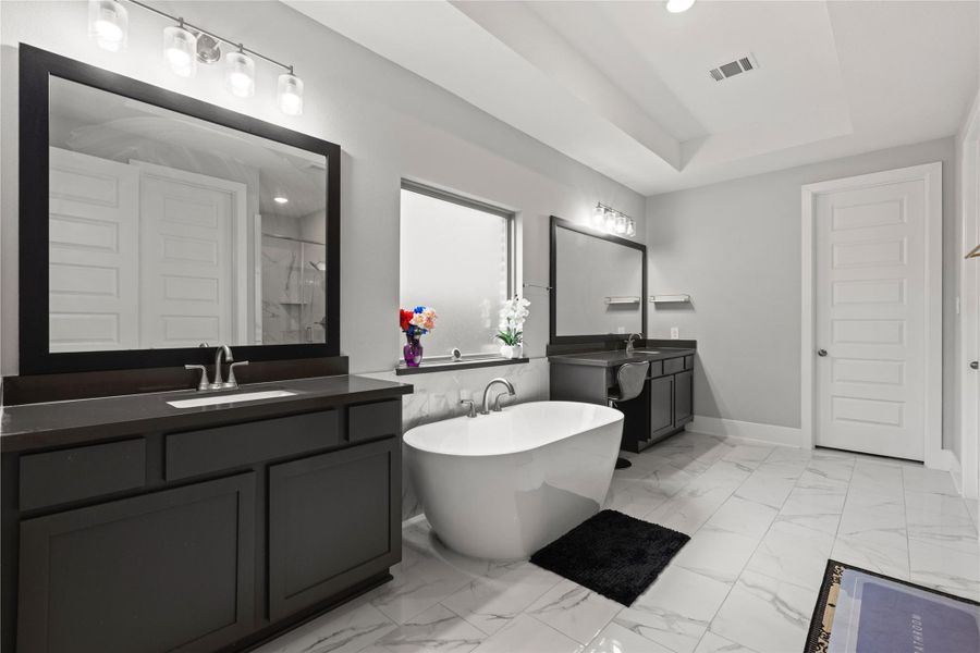 Primary bathroom with double vanity, his and hers Primary bathroom with double vanity, his and hers