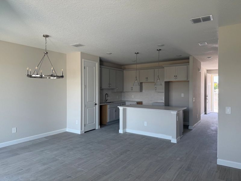 Open concept plan allows for a seamless flow between kitchen, living and dining spaces Open concept plan allows for a seamless flow between kitchen, living and dining spaces