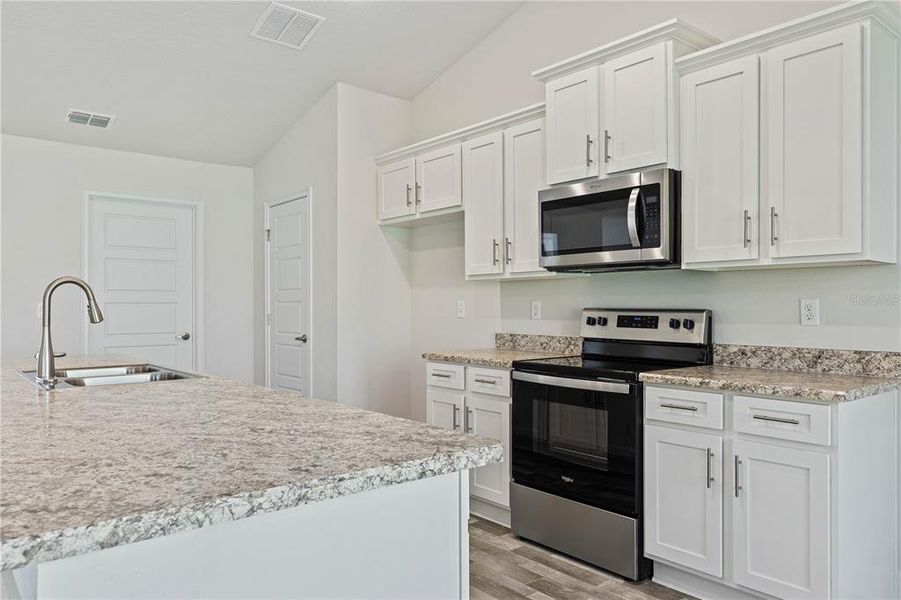 Furnished interior view inside a new home in Palm Coast, Palm Coast (Image 9). Furnished interior view inside a new home in Palm Coast, Palm Coast (Image 9).
