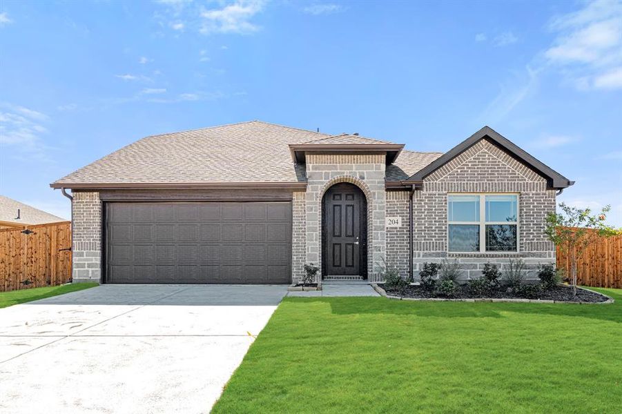 Front exterior of a new home in East Oak Creek Elements, Commerce, TX, highlighting curb appeal (Image 20).