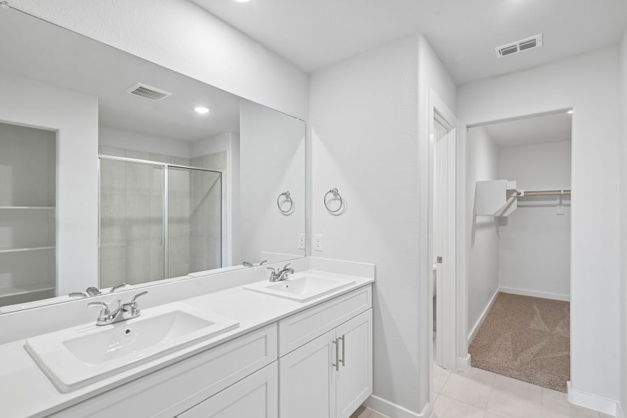 Primary Bathroom in the Hayden home plan by Trophy Signature Homes