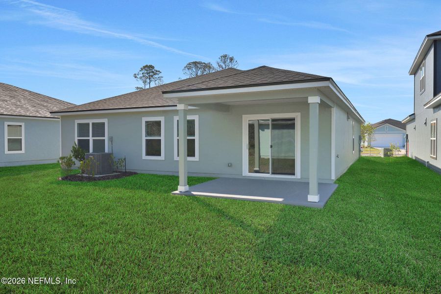 Exterior details and patio area of a home in Wilford Oaks, Orange Park (Image 25).