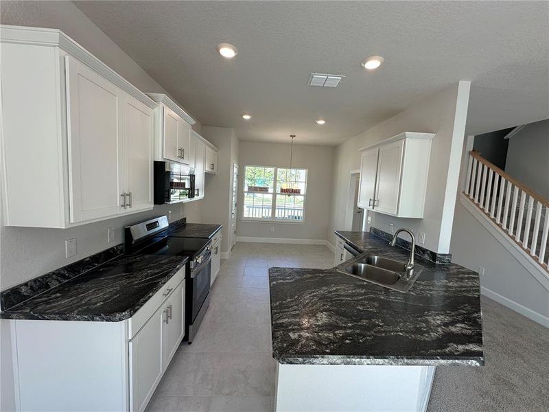 Furnished interior view inside a new home in , Ocala (Image 7).