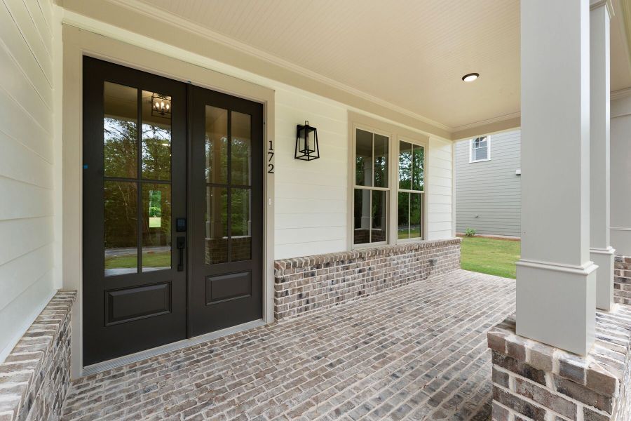 Exterior details and patio area of a home in Lake Arrowhead, Waleska (Image 4).