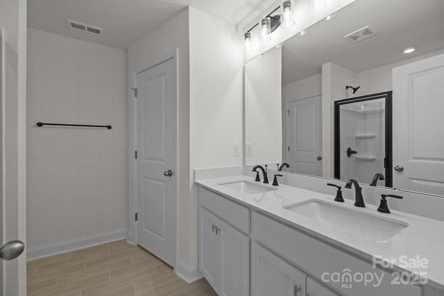 Furnished interior view inside a new home in Greenway Overlook, Charlotte (Image 25). Furnished interior view inside a new home in Greenway Overlook, Charlotte (Image 25).