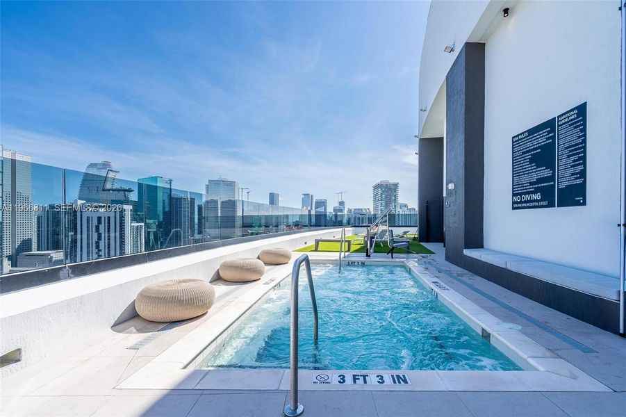Condo located in Miami, FL showcasing its design and architecture (Image 24).