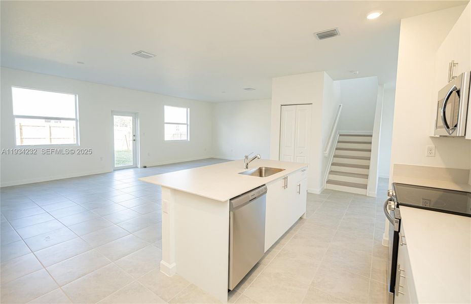 Furnished interior view inside a new home in Acacia Groves, Miami (Image 12).