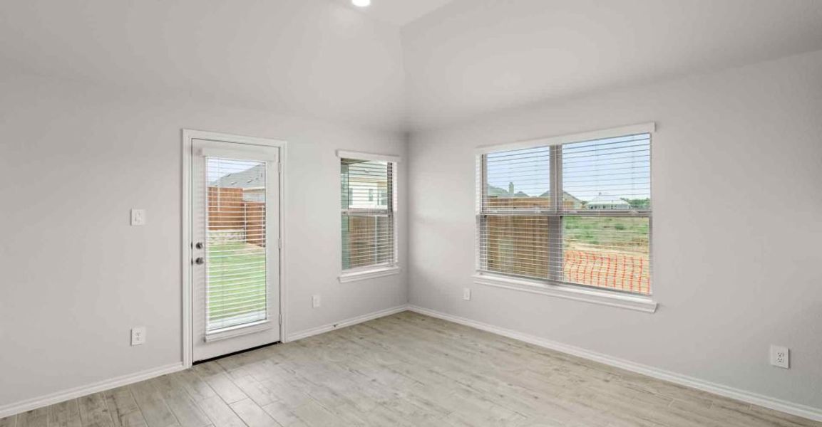 Representative exterior photo of a completed home built from the Atlanta by Impression Homes in Keeneland, Aubrey, TX (Image 12).