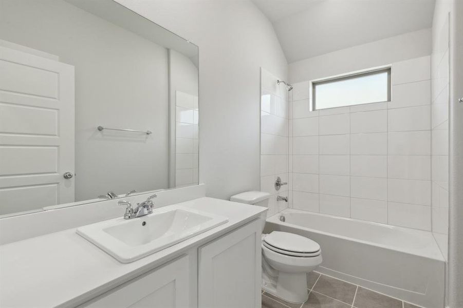 Bathroom in the Harrison home plan by Trophy Signature Homes – REPRESENTATIVE PHOTO Bathroom in the Harrison home plan by Trophy Signature Homes – REPRESENTATIVE PHOTO