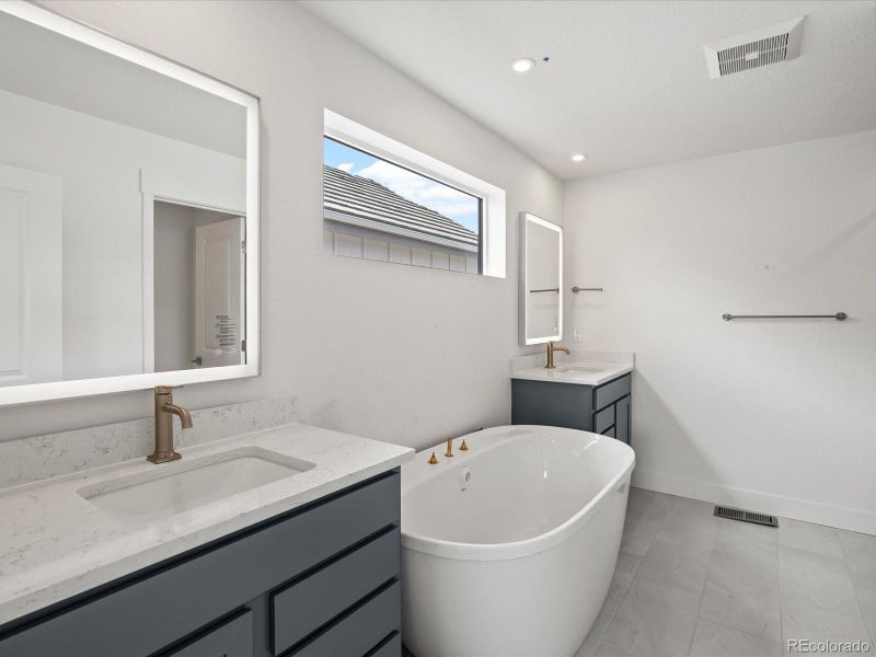 Furnished interior view inside a new home in Ascent at Inverness, Englewood (Image 2).