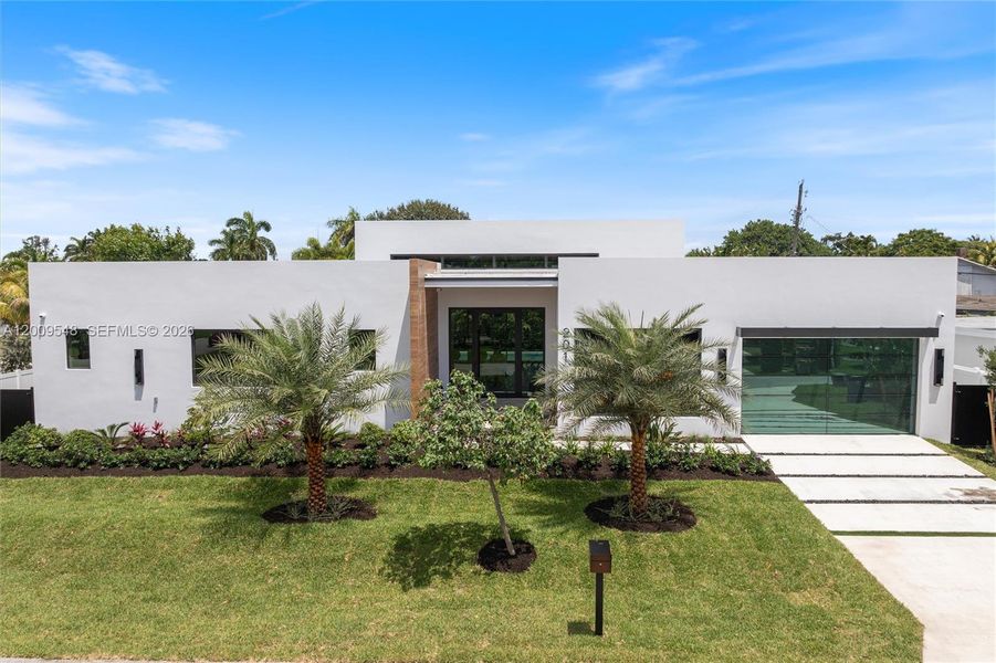Front exterior of a new home in , Wilton Manors, FL, highlighting curb appeal (Image 1). Front exterior of a new home in , Wilton Manors, FL, highlighting curb appeal (Image 1).