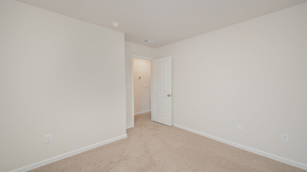 Spacious, unfurnished interior of a new home in Indigo Preserve, Leland (Image 23).