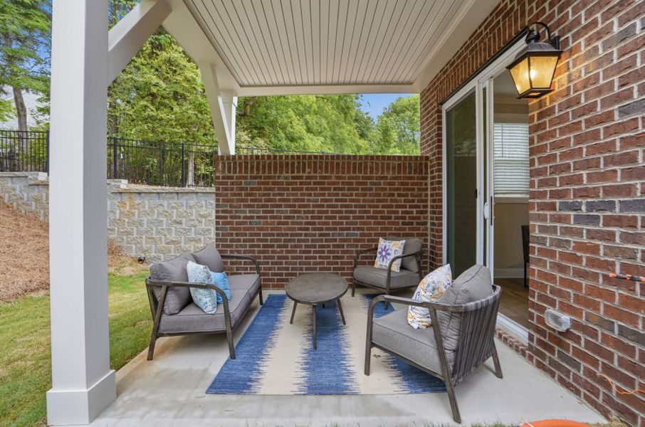 Exterior details and patio area of a home in The Townes at Wade Ardrey, Charlotte (Image 27). Exterior details and patio area of a home in The Townes at Wade Ardrey, Charlotte (Image 27).