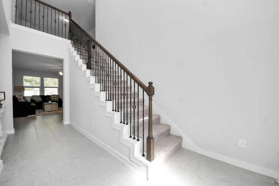 Love the Wrought Iron Stair Railing. Love the Wrought Iron Stair Railing.