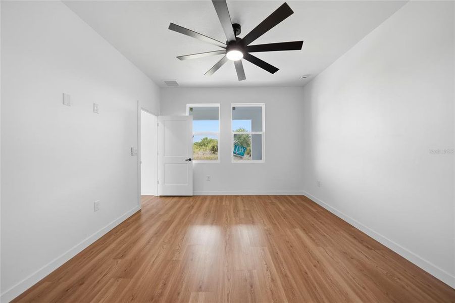 Spacious, unfurnished interior of a new home in , Port Charlotte (Image 48).