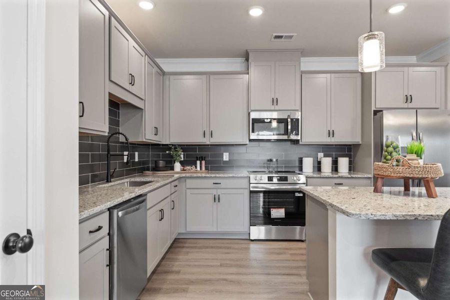 Furnished interior view inside a new home in Crescent Towns, Riverdale (Image 15).