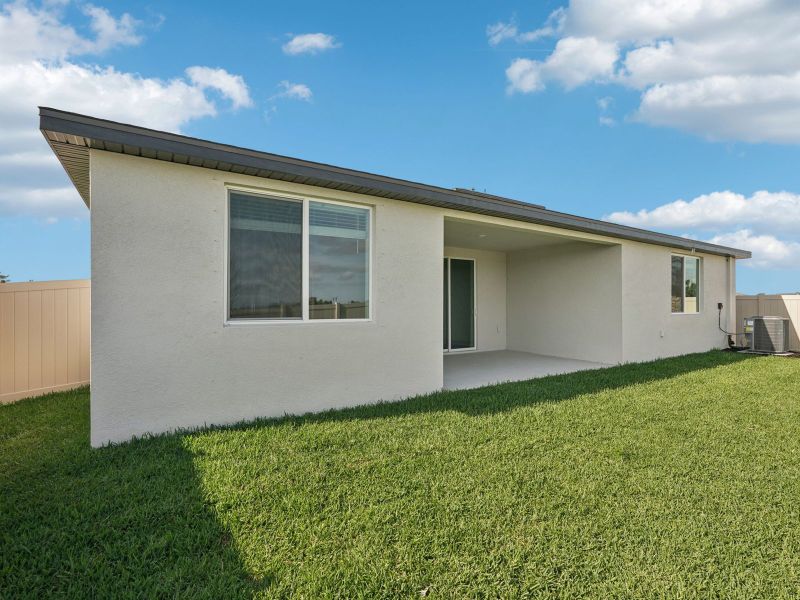 Exterior details and patio area of a home in Oakfield Trails - Signature Series, Parrish (Image 3). Exterior details and patio area of a home in Oakfield Trails - Signature Series, Parrish (Image 3).