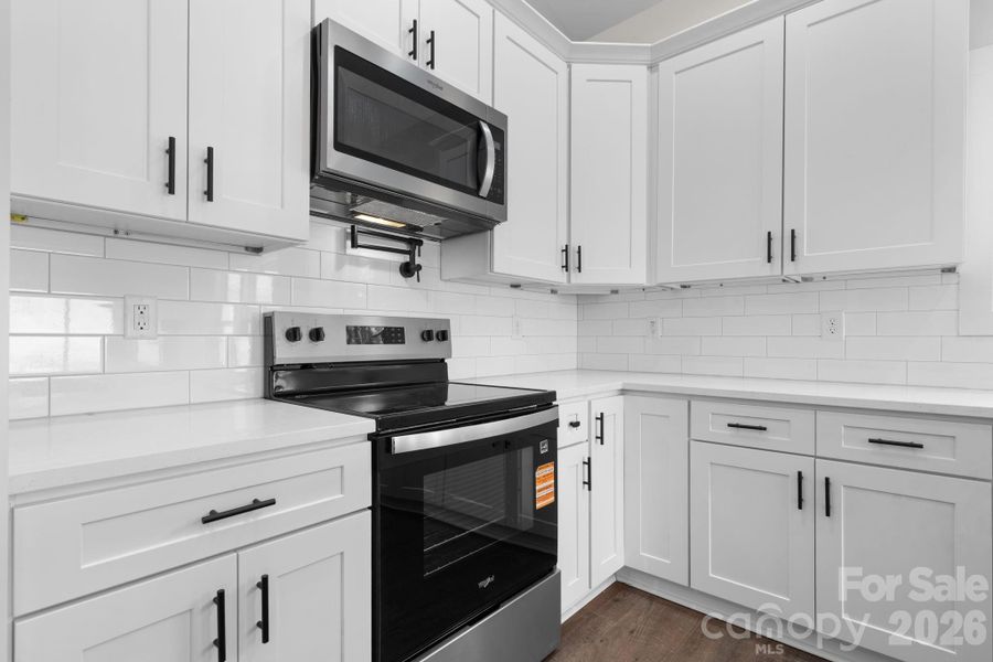 Furnished interior view inside a new home in , Lenoir (Image 6).