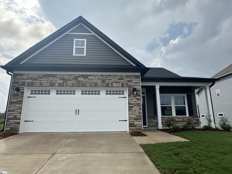 Front exterior of a new home in Shiloh Trail, Wellford, SC, highlighting curb appeal (Image 2). Front exterior of a new home in Shiloh Trail, Wellford, SC, highlighting curb appeal (Image 2).