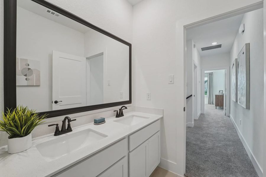 Representative furnished interior of a home built from the Versailles by Chesmar Homes in Bridgeland Chateau, Cypress (Image 14).