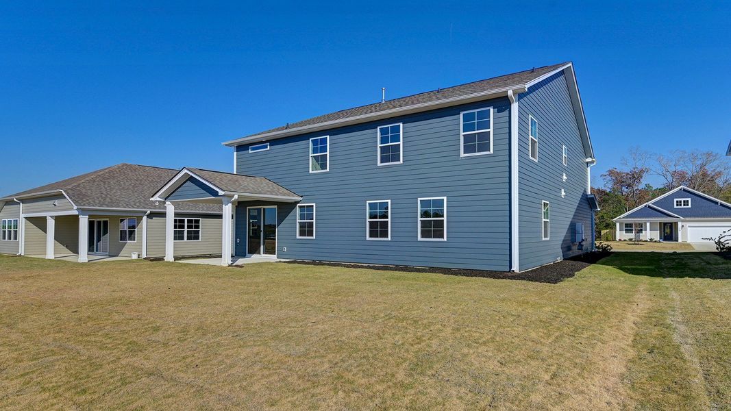 Exterior details and patio area of a home in Livingston Woods, Irmo (Image 30). Exterior details and patio area of a home in Livingston Woods, Irmo (Image 30).