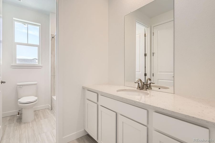 Furnished interior view inside a new home in Macanta: The Grand Collection, Castle Rock (Image 6).