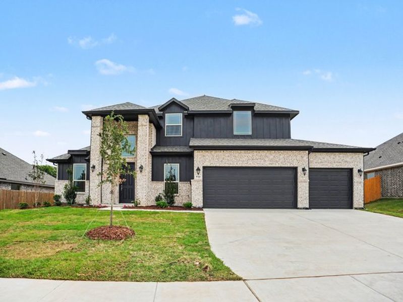 Front exterior of a new home in Cole Crossing Estates, DeSoto, TX, highlighting curb appeal (Image 15).