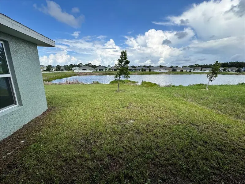 Exterior details and patio area of a home in Watercress Cove, North Port (Image 1). Exterior details and patio area of a home in Watercress Cove, North Port (Image 1).