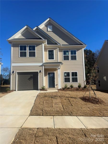 Front exterior of a new home in , Charlotte, NC, highlighting curb appeal (Image 1). Front exterior of a new home in , Charlotte, NC, highlighting curb appeal (Image 1).