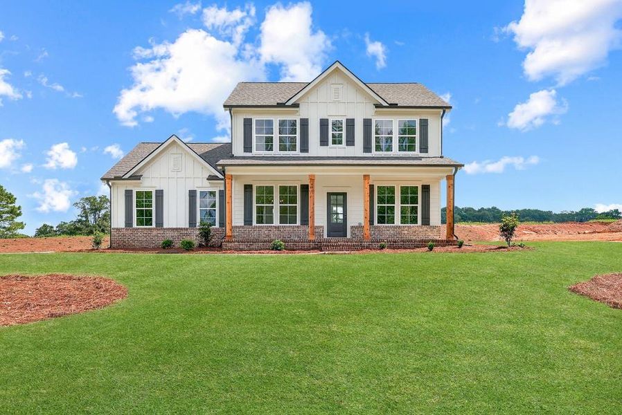 Front exterior of a new home in Magnolia Ridge, Monroe, GA, highlighting curb appeal (Image 24).
